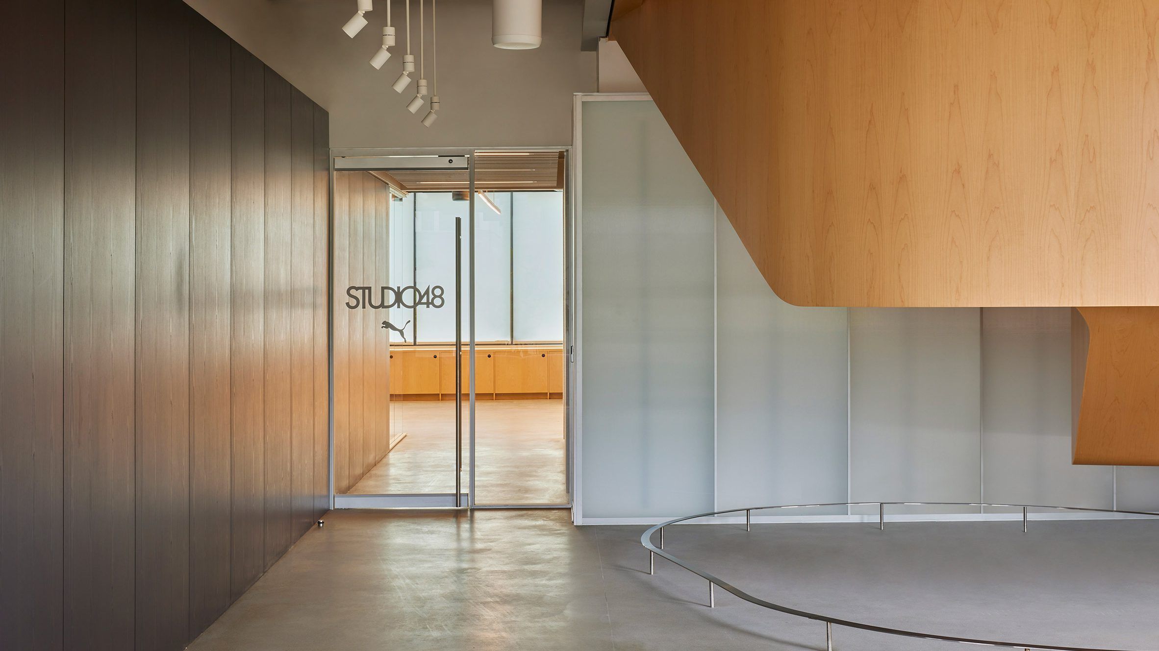 West of West places sculptural wood staircase in Puma Studios LA